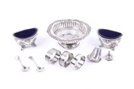 A small collection of silver including a pair of silver oval salts.