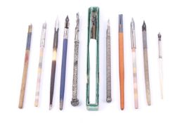 Eleven Victorian and later dip pens including three 'Alum Bay sands examples.