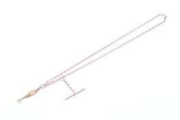 An early 20th century gold fish pendant and a watch chain.