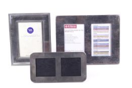 A silver-plated rectangular photograph frame with a Terence Conran label verso,