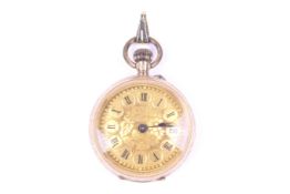 An early 20th century gold open face keyless fob watch.