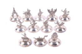A set of twelve 'Siam Sterling' place markers.