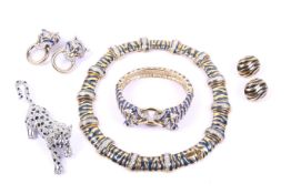 A gold-plated enamel and paste suite of costume jewellery paying tribute to The Duchess of