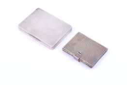A silver snuff box and a white metal four fold photograph pocket wallet.