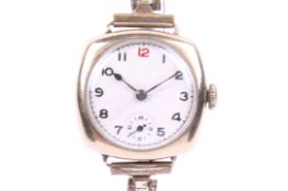Longines, a lady's 9ct gold cushion-cased wrist-watch on a rolled-gold bracelet.