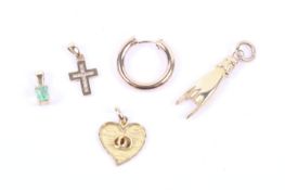 A small collection of jewellery including a French gold witch's heart pendant.