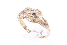 A 18ct gold emerald ruby and diamond and formerly half pearl ring.