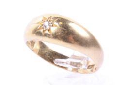A late Victorian 22ct gold and small diamond single stone gypsy ring.