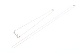 Two vintage Continental yellow metal necklaces.