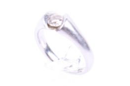 A diamond solitaire ring. The round brilliant on a GIA certificate stating the weight to be 0.