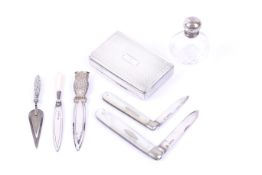 A George IV silver engine turned rectangular snuff box and other small items.