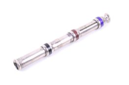 An early 20th century three-colour propelling pencil.