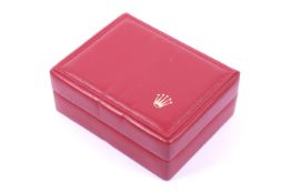 Rolex, a vintage red leather watch box, circa 1998.
