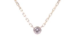 A diamond single stone necklace.