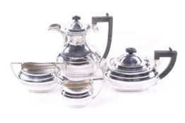 A silver oblong four piece tea service.