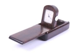 Van Cleef and Arpels, a hardwood cased purse or travel watch.