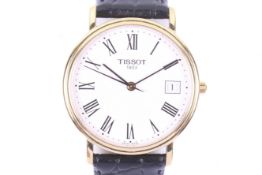 Tissot, a gentleman's gold-plated and stainless steel round quartz wrist watch.