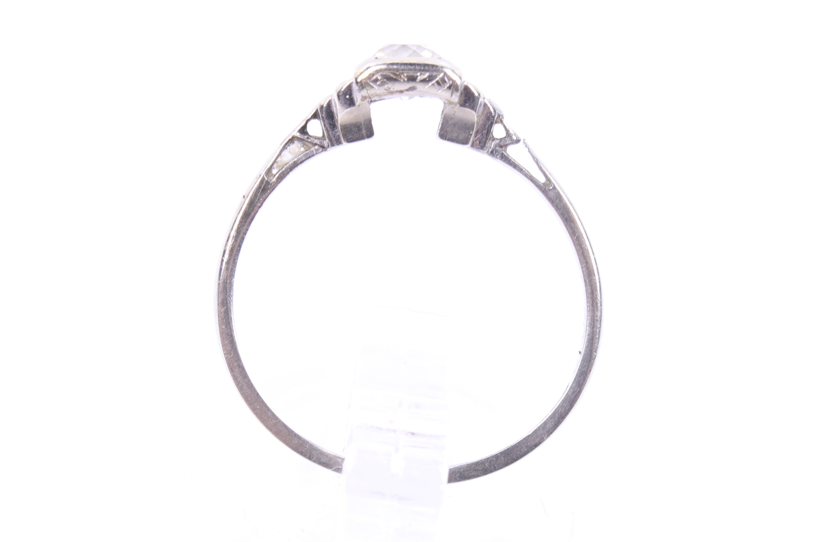 A mid-20th century gold and diamond solitaire eing. The old-cut diamond approx. 0. - Image 3 of 4