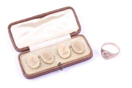 A pair of 9ct gold oval twin panel cufflinks and a matching signet ring.