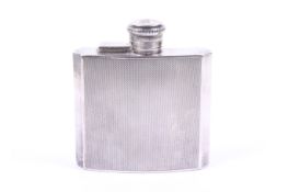 An Art Deco silver spirit or hip flask.