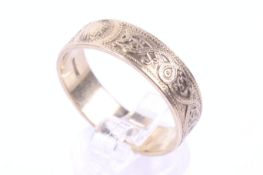 A vintage 9ct 'Celtic' broad band ring.