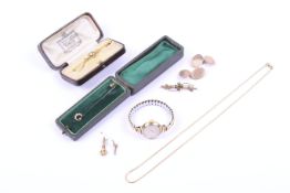 A collection of gold and yellow metal jewellery.