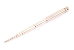 A reeded cylindrical propelling pencil. Marked 'PAT.Aug.