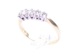 An 18ct gold and diamond five stone ring. The round brilliants approx. 0.