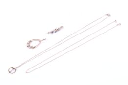 An Edwardian gold and half-pearl drop-shaped open pendant and chain,