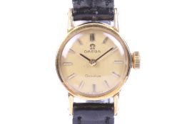 Omega, Geneve, a lady's small round wrist watch.
