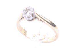 A vintage 18ct gold and diamond solitaire ring. The round brilliant approx. 0.