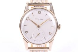 Longines, a gentleman's 9ct gold cased round wrist watch, circa 1948, on a later bracelet.