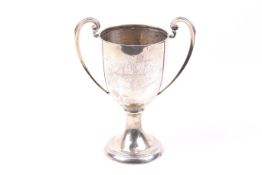 A silver trophy cup.