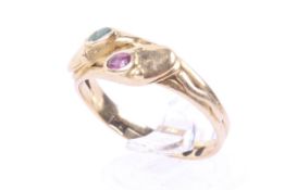 A Victorian 18ct gold and gem set twin snakes ring.