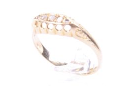 An Edwardian 18ct gold and rose diamond five stone ring.