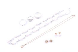 A 9ct gold and cultured pearl pendant and chain and other items.