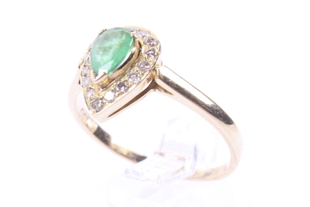 A vintage gold, emerald and diamond pear-shaped cluster ring. - Image 1 of 4