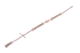 A late Victorian rolled-gold fancy link 'albertina' or watch chain.