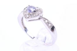 A 9ct white gold, tanzanite and diamond heart-shaped cluster ring.