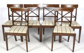 A set of six late 20th Century Georgian style cross-back mahogany inlaid chairs.