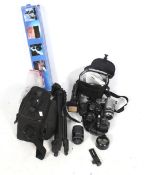 An assortment of film and digital cameras.