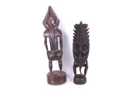 Papua New Guinea. Two Sepik River ancestral standing figures.