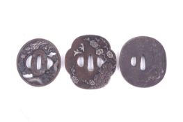 Three Japanese 19th/20th century metal tsuba.