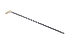 A 20th century walking stick. Having a horn handle and engraved gilt metal presentation collar.