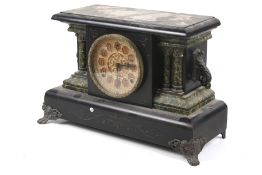 A Victorian mantel clock.