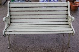 A cast iron garden bench.