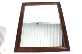 A 20th century bevelled edge wall mirror.