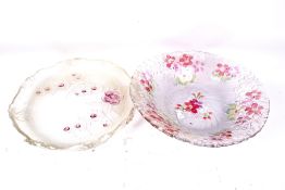 Two 20th century glass dishes. Both having pink floral decoration and shaped rims. Max Diameter 32.