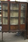 An Edwardian satinwood inlaid mahogany display cabinet.