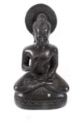 A 20th century cast bronze seated Buddha.